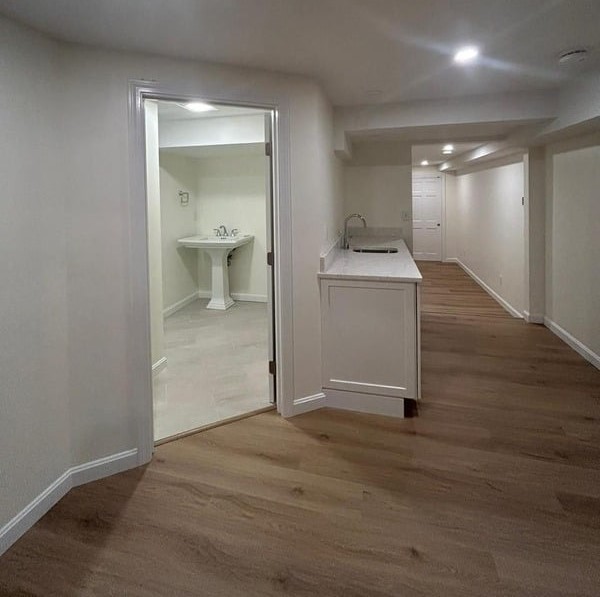 Basement entertainment area with clean walls